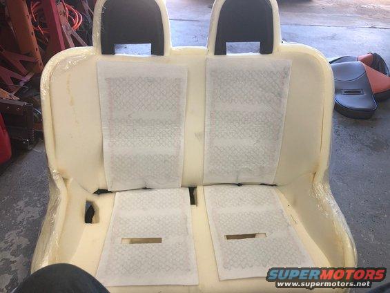Car seat foam with heating elements visible