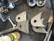 1992 Jeep Wrangler - Metal fabrication parts and tools are laid out on a workbench, ready for assembly or modification.