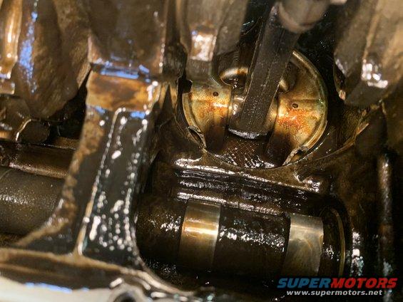 Engine internals with damaged piston and connecting rod