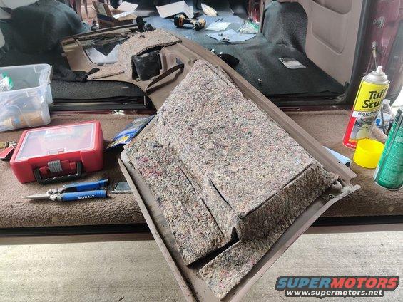 img_20200822_135924.jpg 20200822 - Starting to reinstall some trim. I had to install and uninstall several times to perfect where to trim the flooring so everything would fit okay. One specific example is the HMF white foam got in the way of the rear cup holders in these cargo side panels. I had to cut away a section to allow these to close. Even then, just the MLV and CCF made it a little tough to close them. The backs of these cargo side panels have padding. I had to cut away the section behind the pocket and use high-strength spray cement to hold the rest of the padding in place. Leaving the padding on the back of the pocket caused the panel to bulge a lot, that's why I had to remove it.