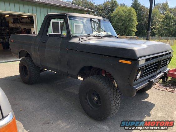 1978 Ford Bronco with matte black paint and lifted suspension