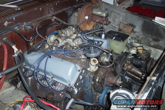 1978 Ford Bronco engine bay with V8 engine and Ford valve covers