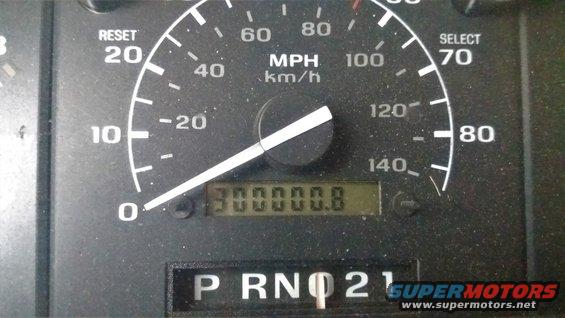 Odometer shows 300000.8 miles. Gear selector is in Park (P)