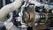 2005 Ford Mustang - Close-up view of an engine's timing chain and camshaft components.