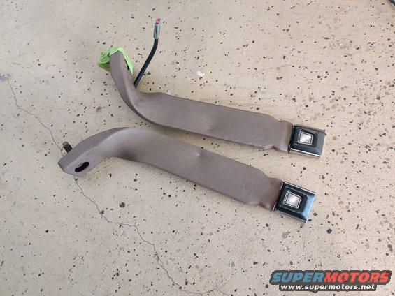 20200901 - Medium mocha seatbelt buckles, I replaced mine with 40/20/40 seatbelt buckles. Both work perfectly, no sticking and no need to use excessive force. Comes with the 2 bolts and 2 washers to mount them.