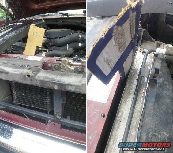 Engine bay with cardboard blocking part of the radiator and engine components visible