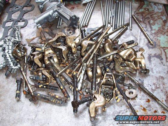 000_0049.jpg Old rockers, rods, and bolts. Double roller timing chain and high volume oil pump awaiting their new home.