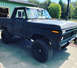 1978 Ford Bronco - This lifted 1978 Ford Bronco is presented in a matte black finish, its off-road capabilities.