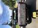 1978 Ford Bronco - This Ford Bronco's tailgate is prepped for paint, showing primer and rust patches.