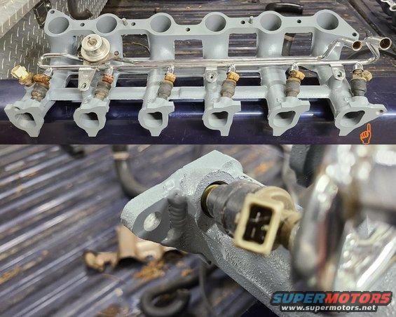 manifoldrepaired.jpg After washing & sandblasting, I had a machinist weld the tab back onto the intake, then plane it & the exhaust manifolds. Then I painted it inside & out.