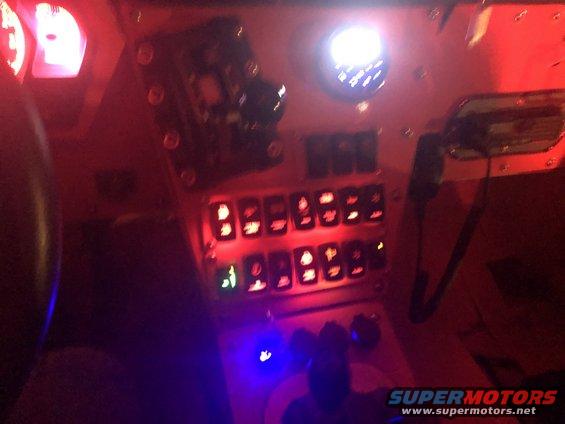 Custom dashboard interior with illuminated switches and gauges