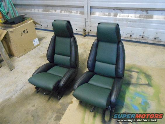 Pair of green and black car seats