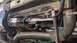 1995 Ford Bronco - This image shows the engine's cooling fan assembly and associated hoses, not the entire vehicle.