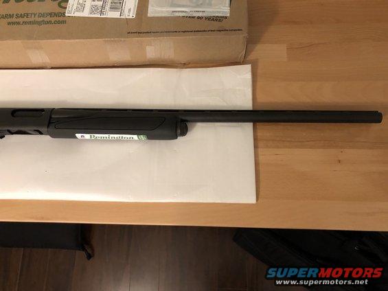 Remington shotgun barrel and receiver with "Remington" logo visible