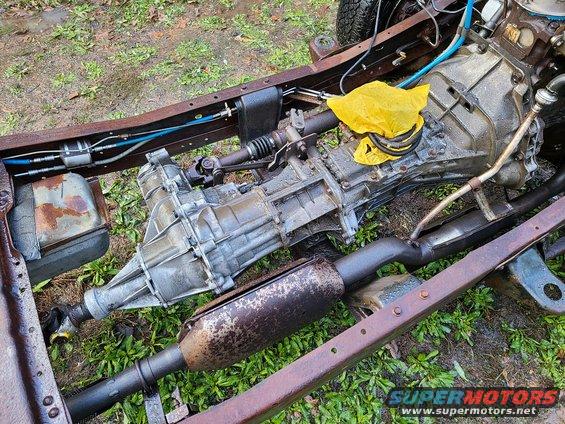 20210119_161050.jpg After throwing the bed off, I pressure-washed the whole thing again. I'll probably put all the transmission-related parts (trans, clutch hydraulics, pedals, crossmember) together as a kit.