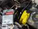 1996 Ford Bronco - The A/C leak seems to have been from the high-side fitting. The (abandoned) alarm speaker was removed so a water bottle…