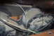 1978 Ford Bronco - Heater blower motor housing with visible rust and wiring.