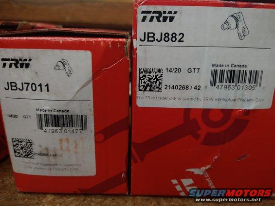 Two red TRW boxes, one labeled JBJ7011 and the other JBJ882, both made in Canada