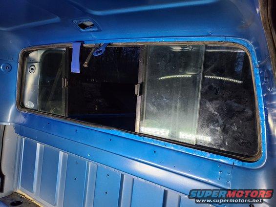 Blue truck interior with split rear window