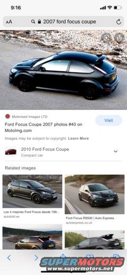 Black Ford Focus coupe parked on a dirt road
