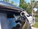 2018 Toyota 4Runner - Suction cup mounts are attached to the vehicle's window frame, with another vehicle visible in the background.