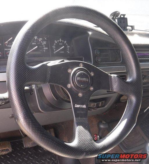 Found a too-good-to-pass-up alternate steering wheel with matching QR top half, days after settling on the previously pictured one.