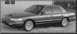 1995 Mercury Grand Marquis - A 1995 Mercury Grand Marquis sedan is shown from the front three-quarter angle.