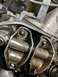 1974 Dodge Challenger - Detailed view of engine valve train components, showing rocker arms and valve stems with visible markings.