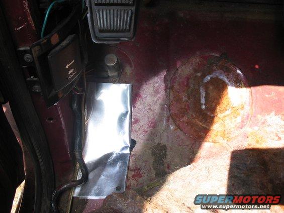 107_0766.jpg pulled up the carpet by the high beam switch, and yup...big rust hole, enough to swallow the heel of my boot, aluminum bandaid is the only way to fix it at this time.