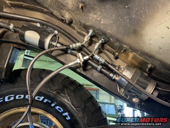 Fuel filter assembly with braided lines next to BFGoodrich tire