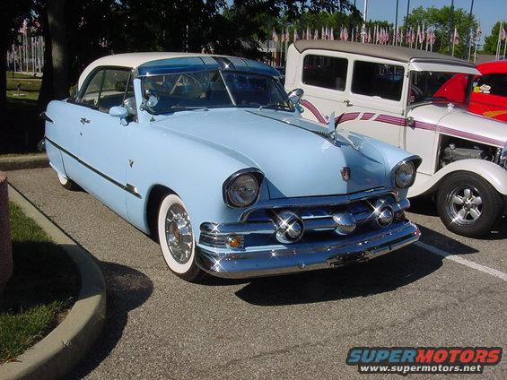 eastlake-006.jpg Hey what's with the center bullet on this '52 Ford shoebox?? Or the '57 Chevy headlights??  Or the Cadillac wheel covers?? Or the Packard hood ornament?? 