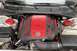 2006 Dodge Magnum - Close-up of a Dodge 5.7L V8 Hemi engine, identified by the R/T emblem on its red engine cover.