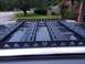 2018 Toyota 4Runner - Artec roof rack installed on a vehicle's roof, with a residential background.