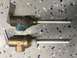 1995 Chevrolet P30 1 Ton - Step Van - Two brass pressure relief valves shown on a speckled garage floor.