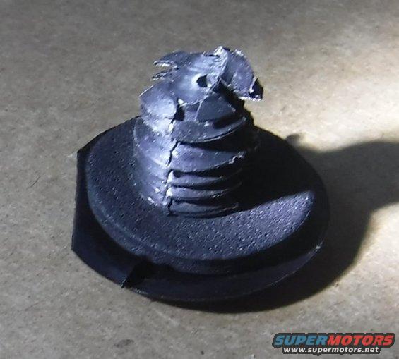 dscf3216--rear-coupler-push-pin-plug.jpg Scrounging through my bag of plastic push pins, I found one the perfect size to function as a coupler plug, since there's not enough room to fit a dust cap over it.

25.1mm top diameter, 11.2mm barb diameter, 7.1mm shaft diameter, clipped to 13.3mm long (shaft)

I trimmed one row of barbs to allow the ball bearings to clip in easier.  A gasket was added to fill the space left between the top lip and coupler.  Finally, I clipped the tip so it wouldn't depress the air valve when inserted into the coupler.