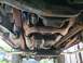 1995 Ford Bronco - There are no substantial leaks, but the transmission pan & mount are grimy, and the rear diff appears to be seeping some oil around the lef…