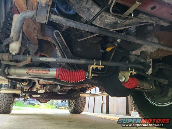 3framefr.jpg The steering seems twitchy, and has poor return-to-center. It's impossible to know if that's because of the 2 steering dampers, or if they were added to reduce even-worse steering characteristics, without disconnecting them (at least temporarily). The sheer quantity of wheel weights is impressive. They may also be part of the drumming vibration in the cabin.
IF THE IMAGE IS TOO SMALL, click it.

[url=https://www.supermotors.net/registry/media/843080][img]https://www.supermotors.net/getfile/843080/thumbnail/cambercammoog.jpg[/img][/url] . [url=https://www.supermotors.net/registry/media/1163600][img]https://www.supermotors.net/getfile/1163600/thumbnail/alignmenot.jpg[/img][/url] . [url=https://www.supermotors.net/registry/media/576903][img]https://www.supermotors.net/getfile/576903/thumbnail/alignmentfrontwheels.jpg[/img][/url] . [url=https://www.supermotors.net/registry/media/1162860][img]https://www.supermotors.net/getfile/1162860/thumbnail/treboot.jpg[/img][/url] . [url=https://www.supermotors.net/registry/media/1163633][img]https://www.supermotors.net/getfile/1163633/thumbnail/20201226_172642.jpg[/img][/url]

Temporarily disconnect steering dampers (to evaluate handling; includes re-connect if handling is worse) $10 ***********
- Remove steering dampers (if handling is better w/o) $20 (return to owner)
R&I tie rods; supply & install 4 new Energy black polyurethane boots $100 ***********
R&R camber cams; supply & install 2 new adjustable cams $140 (cams will be set at current cam sizes if no alignment) ***********
- Add sublet front-end alignment at Oakland Tire & Service $150 ***********
- Add sublet balance & road-force 4 tires at Oakland Tire & Service $?? ***********