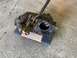 1979 Jeep CJ5 - A heavily soiled transmission assembly is presented for inspection, showing internal gears.