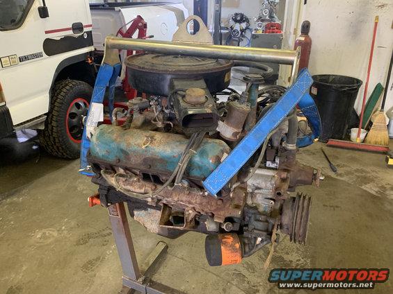 Engine on stand, blue straps attached