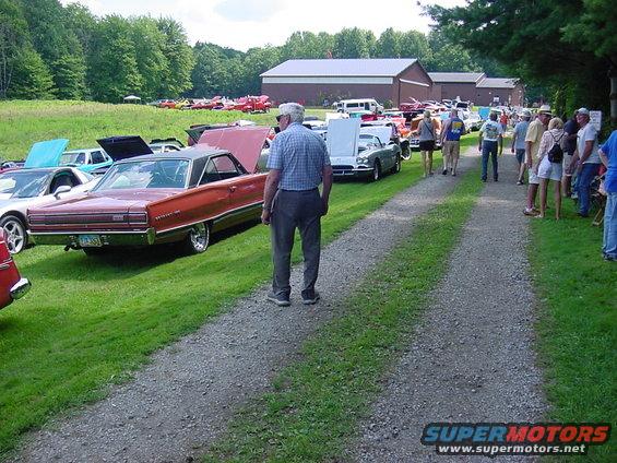 debonnet-car-show-012.jpg You follow this road all the way to the back, and that is where I was parked.  This wasn't easy for Pat's rolator to negotiate.