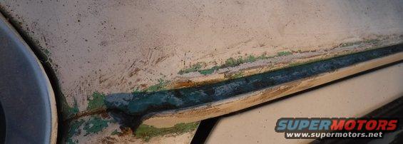 dscf3315--drip-rail-repair-prep.jpg Prepping the drip rail and b-pillar for repair.  Because Bronco.