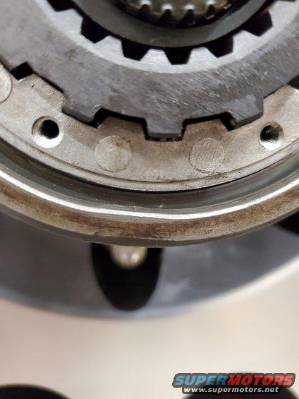 close-up of a metal gear and locking mechanism
