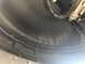 2014 Ford F-150 - Underside view of a vehicle's wheel well liner and suspension components.