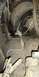 1993 Ford Bronco - Under hood left side wall empty Jack storage/stow hinged holder, swung to OPEN position (secure with wing nut) in 1993…