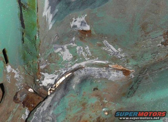 Another view of the gnarly panel gap.