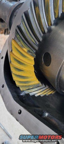 Close-up of differential gears with yellow markings