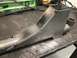1979 Ford Bronco - Custom fabricated steel bracket with a tubular extension, likely for automotive modification.