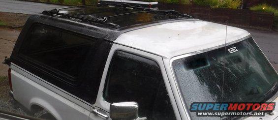 dscf3525--buttoned-up.jpg I painted the old roof light patched and seam sealed holes while I was at it, but of course, matching that off-white spray paint is a losing proposition.