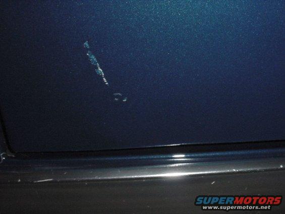 a better shot of the lower scratch.