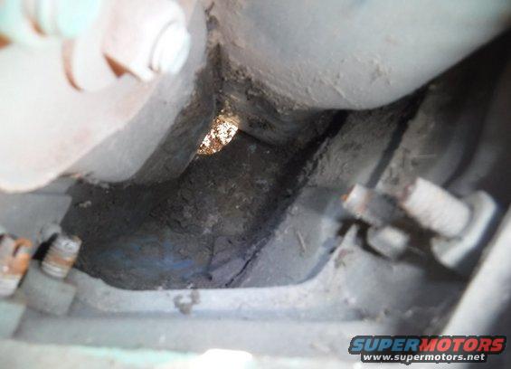 dscf3549--dirt-buildup-below-tail-lights--cleaned-out.jpg Dirt mostly cleared out below the tail light.  You know it's a lot when that size hole isn't big enough to let it fall through.